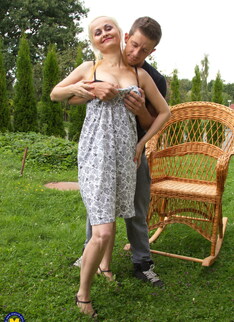 This cougar gets fucked in the open air by a toyboy