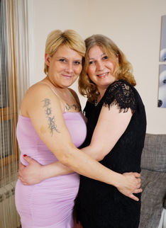 Two curby mature ladies getting wet and wild in the livingroom