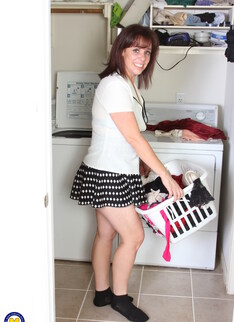 Naughty American slut playing around in the laundry room