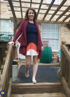 Naughty American MILF fooling around in the garden without panties