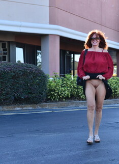 This hot MILF loves playing and showing off her pussy in public