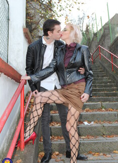 This naughty mature lady seduces her to boy