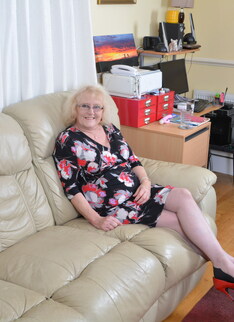 Naughty British mature lady getting wet on her couch