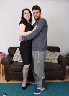 Big breasted British housewife playing with her toyboy