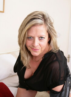 British housewife checking out her new toys