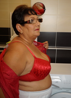 Naughty big mama playing with her toy boy