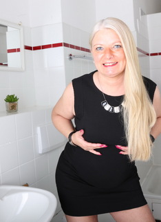 Naughty German housewife taking a shower