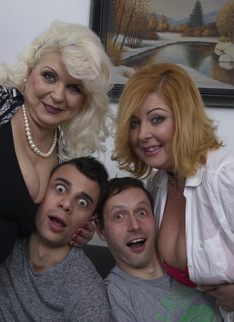 Two housewives doing two younger guys