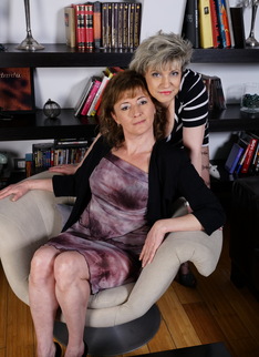 Two naughty housewives getting their lesbian groove on