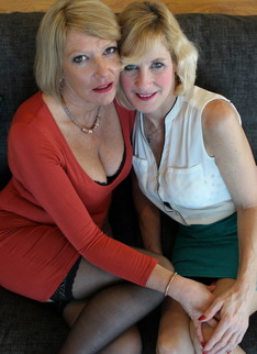 Two British housewives play with each other