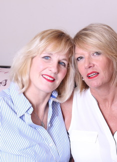 Two naughty mature British lesbians make out