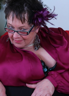 Big Breasted British mature lady fooling around