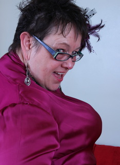 Big Breasted British mature lady fooling around