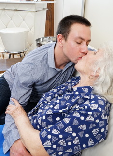 Horny toy boy playing around with a hairy granny