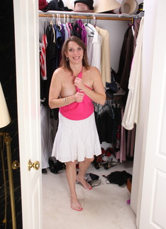 Naughty American housewife dressing up and then some