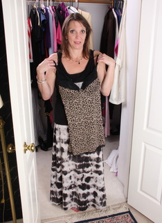 Naughty American housewife dressing up and then some