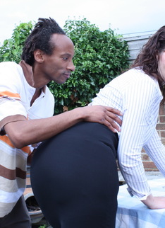 British mom fooling around with a black guy in her garden
