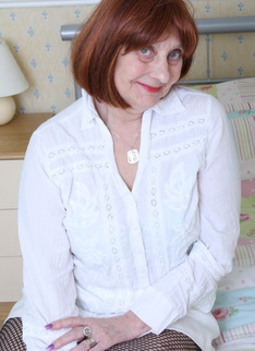 Naughty British mature lady getting wet on her bed