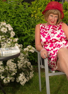 Horny British mature lady playing in the garden