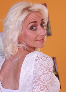 Horny blonde housewife playing with her toy