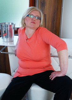Chubby housewife getting wet on her bed