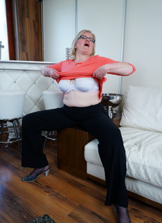 Chubby housewife getting wet on her bed