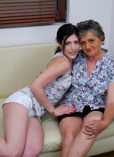 Naughty babe getting seduced by a horny lesbian granny