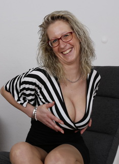 Naughty German housewife showing off her dirty mind