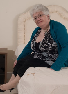 Naughty Big breasted British granny getting frisky