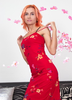 Naughty red housewife getting frisky