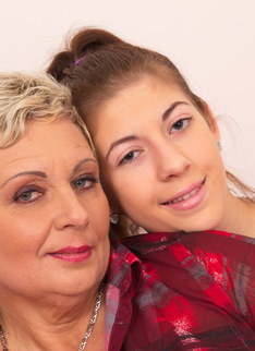Hot old and young lesbian couple playing around