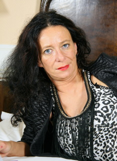 Naughty housewife playing on her bed