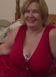 Large British mature lady with big natural tits getting dirty