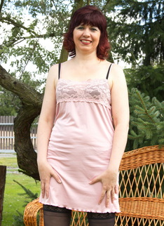 Naughty mama playing in the garden with herself