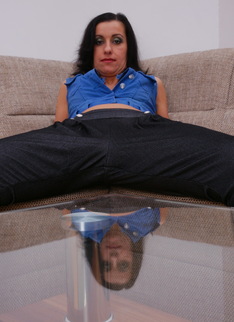 Naughty housewife going solo on her couch