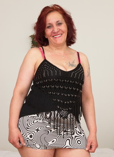 Horny mature lady getting ready to please herself