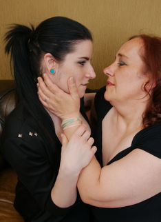 Old and young lesbian couple go at it