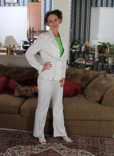Cute American housewife stripping at home