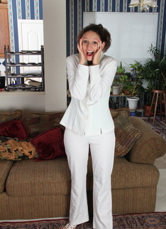 Cute American housewife stripping at home