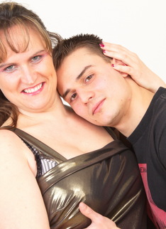 Big breasted mature slut playing with her toy boy
