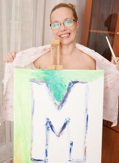 Naughty mature lady playing with paint